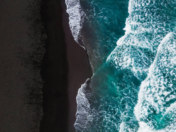 istock Pacific ocean coast with black volcanic sand 1339406352