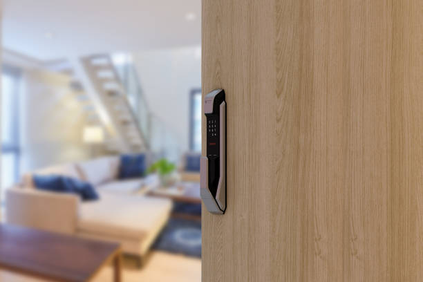 istock Digital Door handle or Electronics knob for access to room security, Door wooden half opening through interior living room background, 1339409593