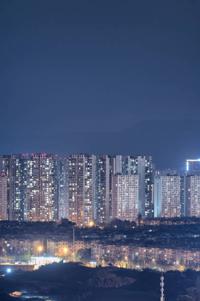 istock Half - night lighted modern apartments and overpasses 1339409739