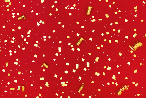 gold glitter on red background