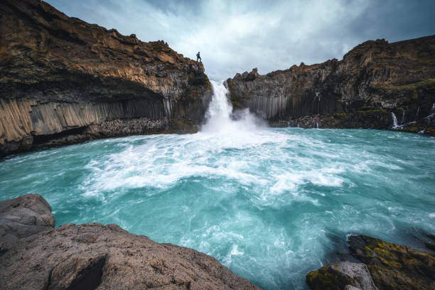istock Man On Top Of Aldeyjarfoss, Iceland 1339412774