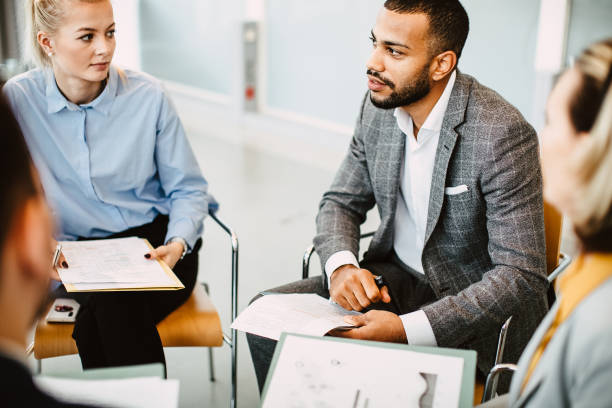 istock Business people having a meeting 1339416987