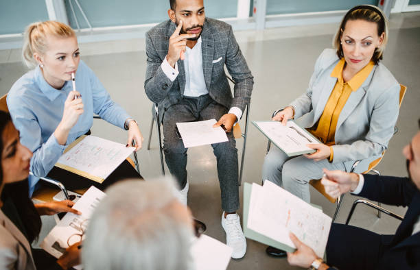 istock Business people having a meeting 1339417252
