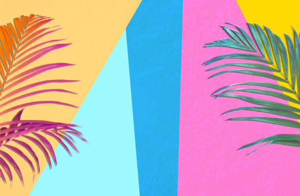 istock Colorful tropical leaves on bright background, flat lay. Creative design 1339425394