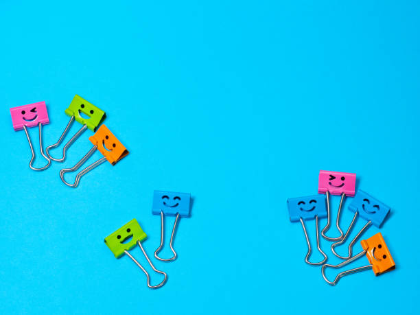 istock Funny smile metal binder clip 1339428400