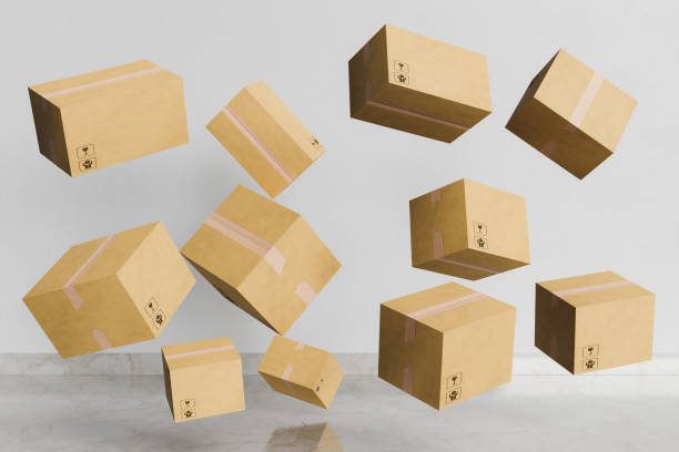cardboard packages floating in a room - havada asılı kalmak stok fotoğraflar ve resimler