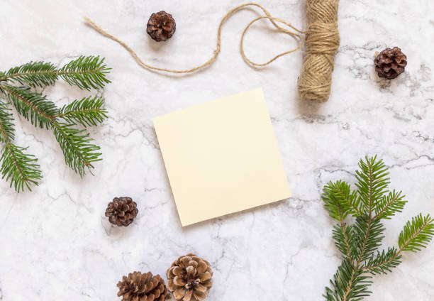 istock Holiday Christmas Composition with a card mockup flat lay 1339431622