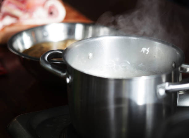istock metal pans in the kitchen close up 1339431766