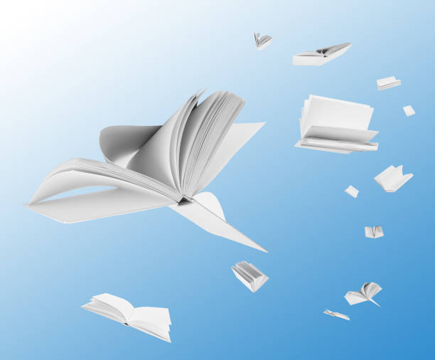 istock Many hardcover books flying on light blue background 1339434258