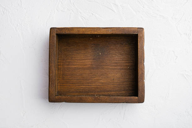 istock Empty wooden box with copy space for text or food, top view flat lay , on white stone table background 1339435172