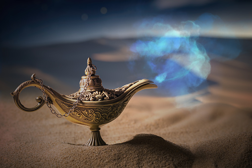 Magical Aladdin oil lamp with genie in desert at night.