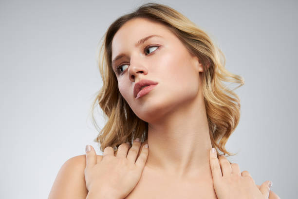 istock Pretty lady with clear skin posing with no makeup. 1339435346