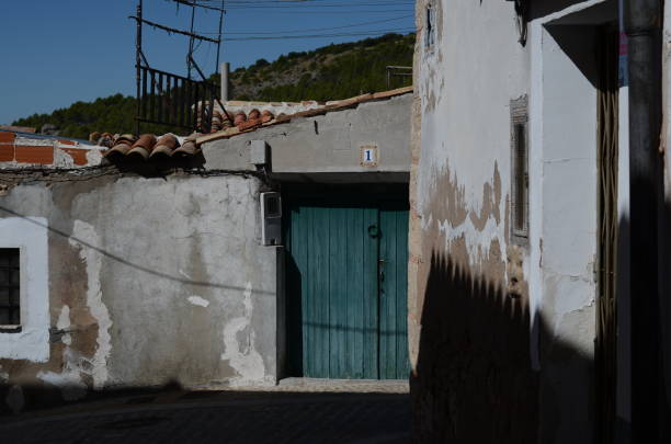 istock Old house with a turquoise door- Spain 1339435452