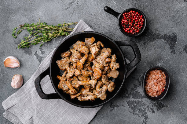 istock Mushroom chanterelles, on gray stone table background, top view flat lay 1339435533