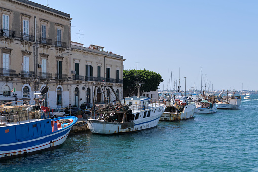 Syracuse, Italy - September 9, 2021: Day shot of Syracuse harbour and its waterfront