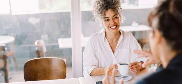 istock Successful businesswoman meeting with a client 1339445371