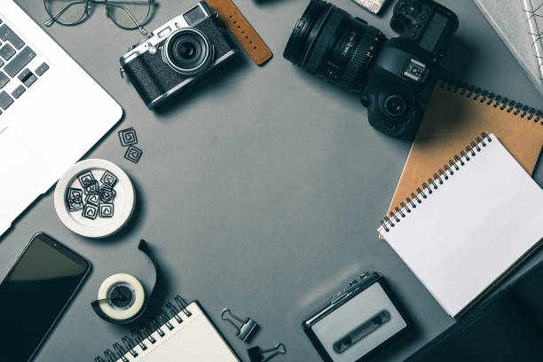 Flat lay composition with equipment for journalist on grey table, space for text Flat lay composition with equipment for journalist on grey table, space for text journalism stock pictures, royalty-free photos & images