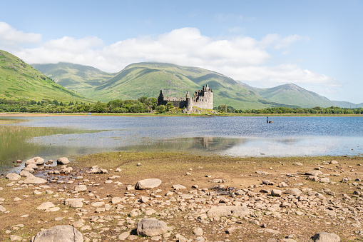 Kilchurn Castle on the edge of Loch Awe including the hills behind