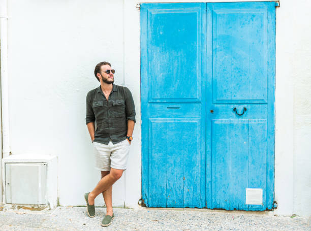 istock Young man enjoys vacation 1339447853