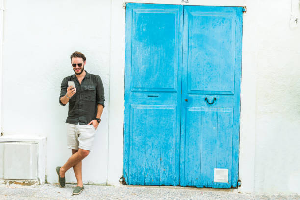 istock Young man enjoys vacation 1339447863