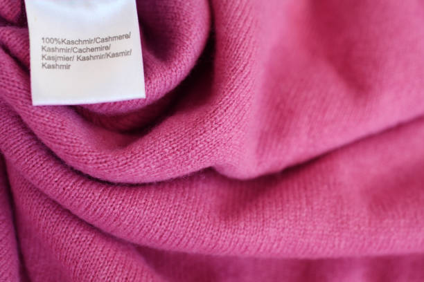 Pink luxury cashmere with tag stock photo