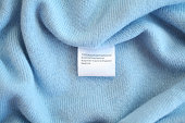 Blue cashmere fabric with tag
