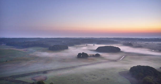 istock Landscape with fog seen from above 1339450503