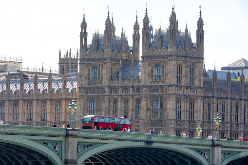 London, UK - Sep 07, 2021:This pic shows normal Traffic on the Westminster bridge with its red double decker bus passing over it.