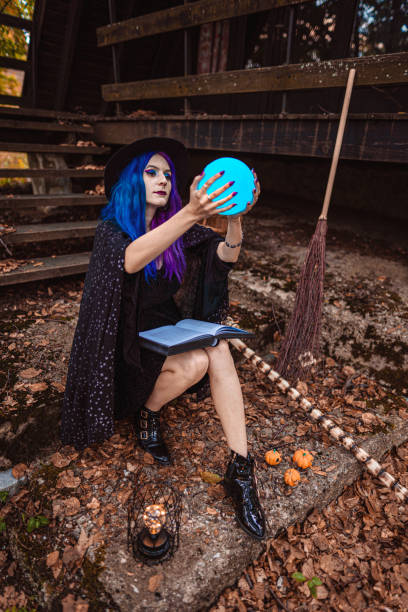 istock The witch casting a spell in her ritual. Preparing for Halloween. 1339458686