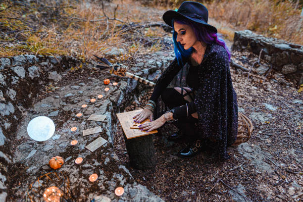 istock Young witch, fortune teller reads Tarot cards. 1339459660