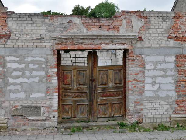 istock Wooden door in demolished building 1339459699