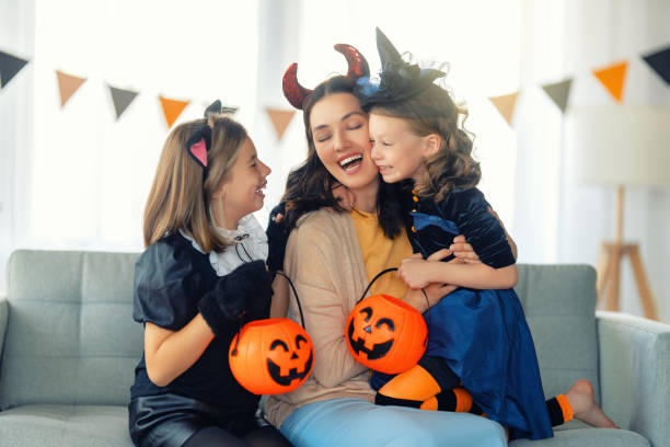 istock Happy family celebrating Halloween 1339460133