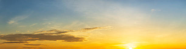 istock Golden sky, sunrise and clouds, panoramic natural scenery 1339461825