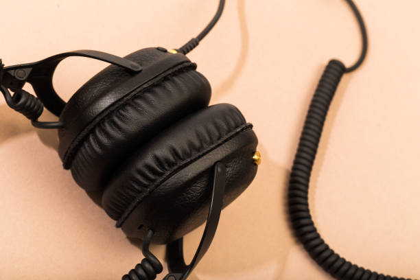 istock headphones on beige  background - Image 1339462766