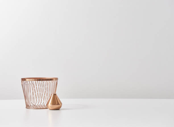 istock white background in gold vase flower 1339465259