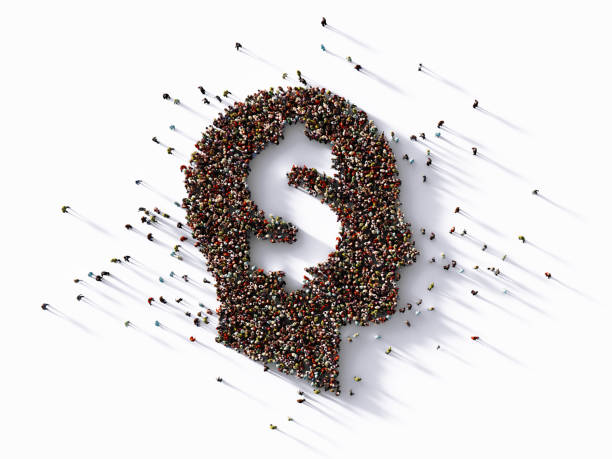 istock Human Crowd Forming Dollar Sign Inside Of A Human Head Shape 1339466543