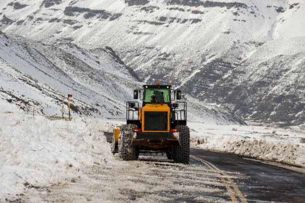istock Tractor tires with chains in the snow 1339466722