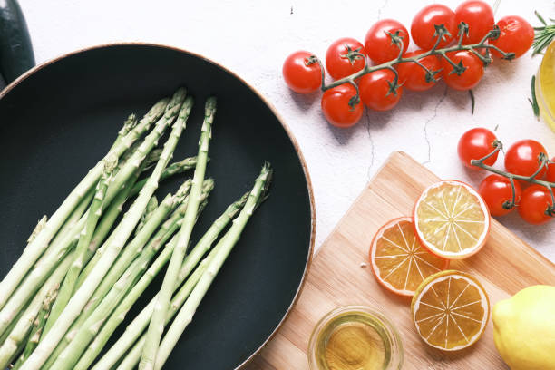 lemon, asparagus, cherry tomato, on table