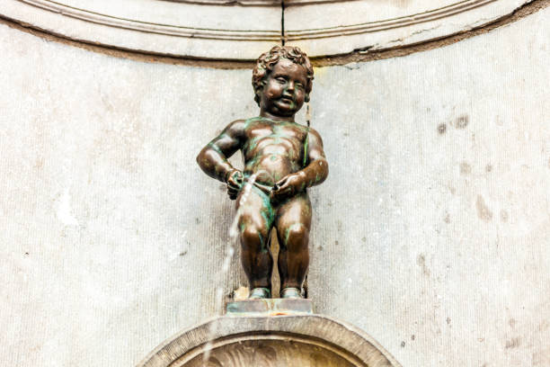 Mannekin Pis in Brussels Mannekin Pis in Brussels

Note:
bronze statue by the sculptor Jérôme Duquesnoy in 1619, manneken pis statue in brussels belgium stock pictures, royalty-free photos & images