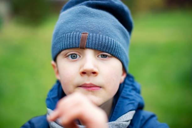 istock Little boy autumn portrait 1339472082