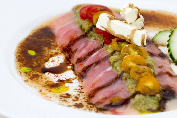 istock Gourmet meat dish beautifully presented 1339475548