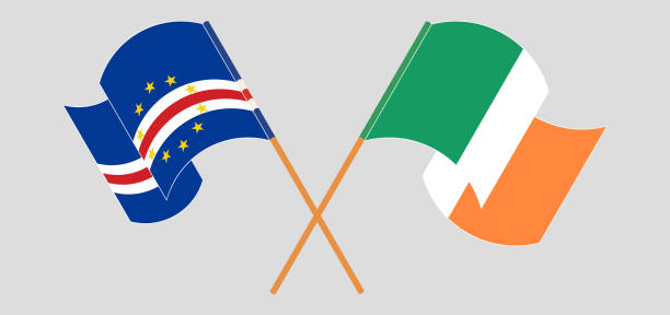gekreuzte und wehende flaggen von kap verde und irland - irish culture republic of ireland irish flag sport stock-grafiken, -clipart, -cartoons und -symbole