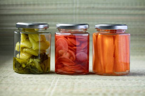 istock Pickled Cabbage, Pickled Reddish, Pickled Carrot in a clear glass jar 1339478664