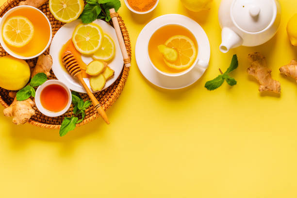 Green tea with lemon, ginger and honey stock photo