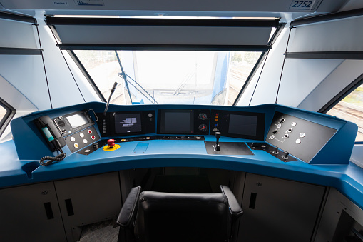 This picture is a cockpit from a modern sprinter train. The curtains are open and in this picture the cockpit is unused. The SNG (sprinter nieuwe generatie) is currently active in the Netherlands.