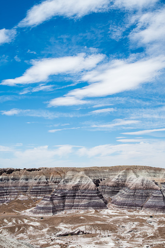 Landscape view during midday of Painted Desert National Park in Arizona. Geological layers are visible.