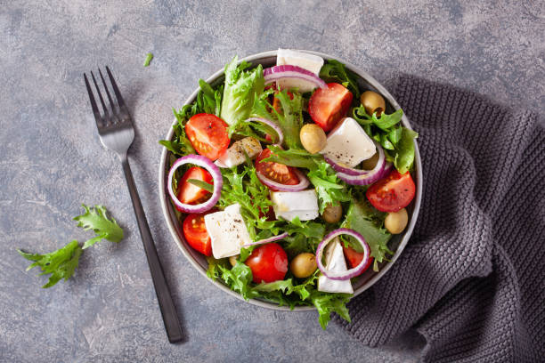 istock tomato salad with brie cheese olives onion lettuce 1339485941
