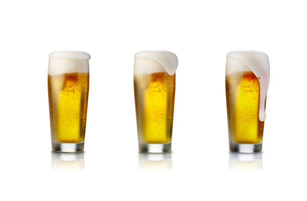 istock Pack of Beer glass isolated on white background with foam. 1339486298