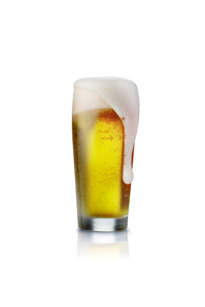 istock Beer glass isolated on white background with foam. 1339486350