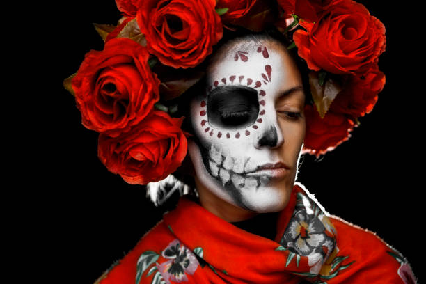 istock Sugar skull creative make up costume with rosses and lace for Halloween looking away 1339488575